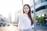 Young Thai business woman outdoors human city. AI generated Image by rawpixel.