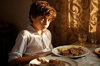 Arabian nine year-old boy food portrait eating. AI generated Image by rawpixel.
