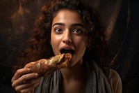 Middle eastern girl biting food eating. 