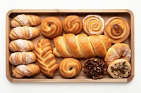 A bakery tray bread food white background. AI generated Image by rawpixel.
