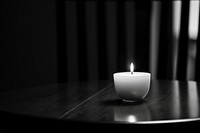 Grief candle table black. AI generated Image by rawpixel.