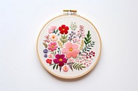A flower embroidery pattern white background cross-stitch. AI generated Image by rawpixel.