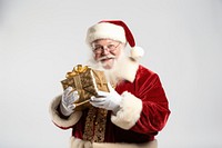 Santa christmas holding gift. AI generated Image by rawpixel.
