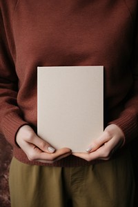 Hand holding white notebook person publication midsection. AI generated Image by rawpixel.