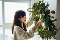 Christmas wreath anticipation celebration decoration. AI generated Image by rawpixel.