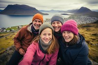 Scandinavian family taking a selfie landscape mountain outdoors. AI generated Image by rawpixel.
