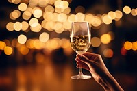 Hand holding wine glass celebration drink refreshment. AI generated Image by rawpixel.