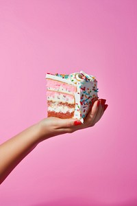 Hand holding birthday cake slice dessert food celebration. AI generated Image by rawpixel.