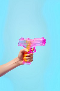 Hand holding water gun toy weapon aggression revolver. AI generated Image by rawpixel.