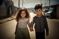 Palestinian young girl portrait family street. 