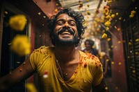 South indian man celebrating new year laughing portrait adult. AI generated Image by rawpixel.