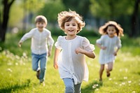 Happy children playing together friendship outdoors grass. AI generated Image by rawpixel.