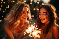 Laughing sparkler sparks female. AI generated Image by rawpixel.