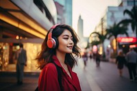 Singaporean woman headphones portrait headset. AI generated Image by rawpixel.
