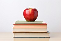 Apple book publication fruit. AI generated Image by rawpixel.
