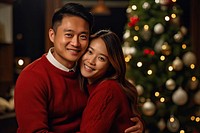 Happy Asian couple christmas sweater adult. AI generated Image by rawpixel.