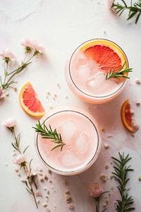 Grapefruit gin fizz cocktail rosemary drink glass. AI generated Image by rawpixel.