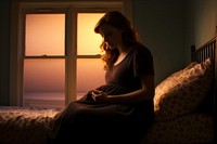 Pregnant woman sits sitting adult bed. AI generated Image by rawpixel.