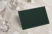 Green business card with blank space