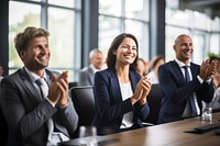 Business people clapping smiling sitting. AI generated Image by rawpixel.