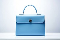 Luxury minimal blue handbag briefcase purse accessories. 