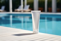 White package sunscreen outdoors pool refreshment. AI generated Image by rawpixel.