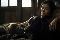 Thai moman sleeping with an black dog pet furniture portrait. AI generated Image by rawpixel.