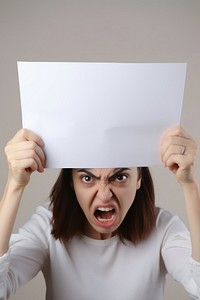 A woman angry paper shouting portrait. AI generated Image by rawpixel.