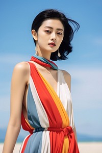 Chinese woman wear minimal beach colorful fashionable portrait dress photo. AI generated Image by rawpixel.