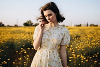 South African woman wearing dress flower field portrait. AI generated Image by rawpixel.