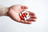 Hand holding pills antioxidant medication variation. AI generated Image by rawpixel.