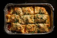 Baked ravioli food meat vegetable. AI generated Image by rawpixel.