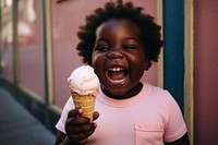 Black chubby kid laughing dessert smiling. 