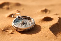 Compass locket sand accessories. AI generated Image by rawpixel.