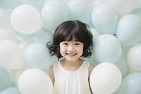 Japanese birthday party balloon child smile. AI generated Image by rawpixel.