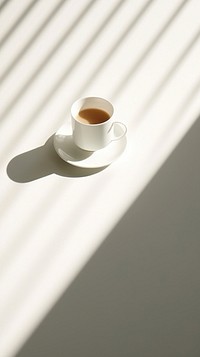 Tea saucer shadow coffee. AI generated Image by rawpixel.