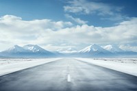 Asphalt road with snow mountains in blue cloud sky landscape outdoors horizon. AI generated Image by rawpixel.