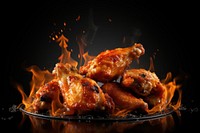 Chicken wings fire grilling burning. AI generated Image by rawpixel.