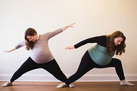 Pregnant women yoga dancing sports. 