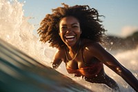 Happy African woman recreation laughing swimming. AI generated Image by rawpixel.