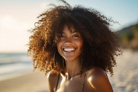 African woman laughing portrait beach. AI generated Image by rawpixel.