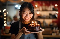 South east asia woman take a photo of her cake camera party birthday dessert. AI generated Image by rawpixel.