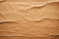 Brown paper crumped texture backgrounds weathered parchment. AI generated Image by rawpixel.