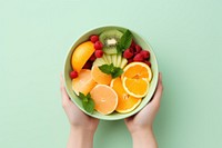 Fruit fresh dish fruit holding berry. AI generated Image by rawpixel.