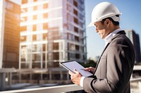 Architect wearing hard hat building sunlight hardhat. AI generated Image by rawpixel.