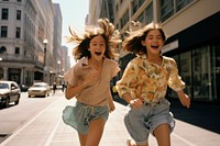 Two young girls running down a downtown street laughing snapshot shorts. AI generated Image by rawpixel.