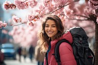 Smiling Latino women with backpack blossom travel smile. AI generated Image by rawpixel.