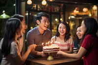 Thai people cake birthday blowing. AI generated Image by rawpixel.