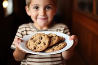 Cookie portrait holding photo. AI generated Image by rawpixel.