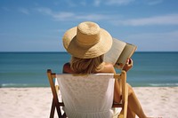 Reading chair beach sunbathing. 